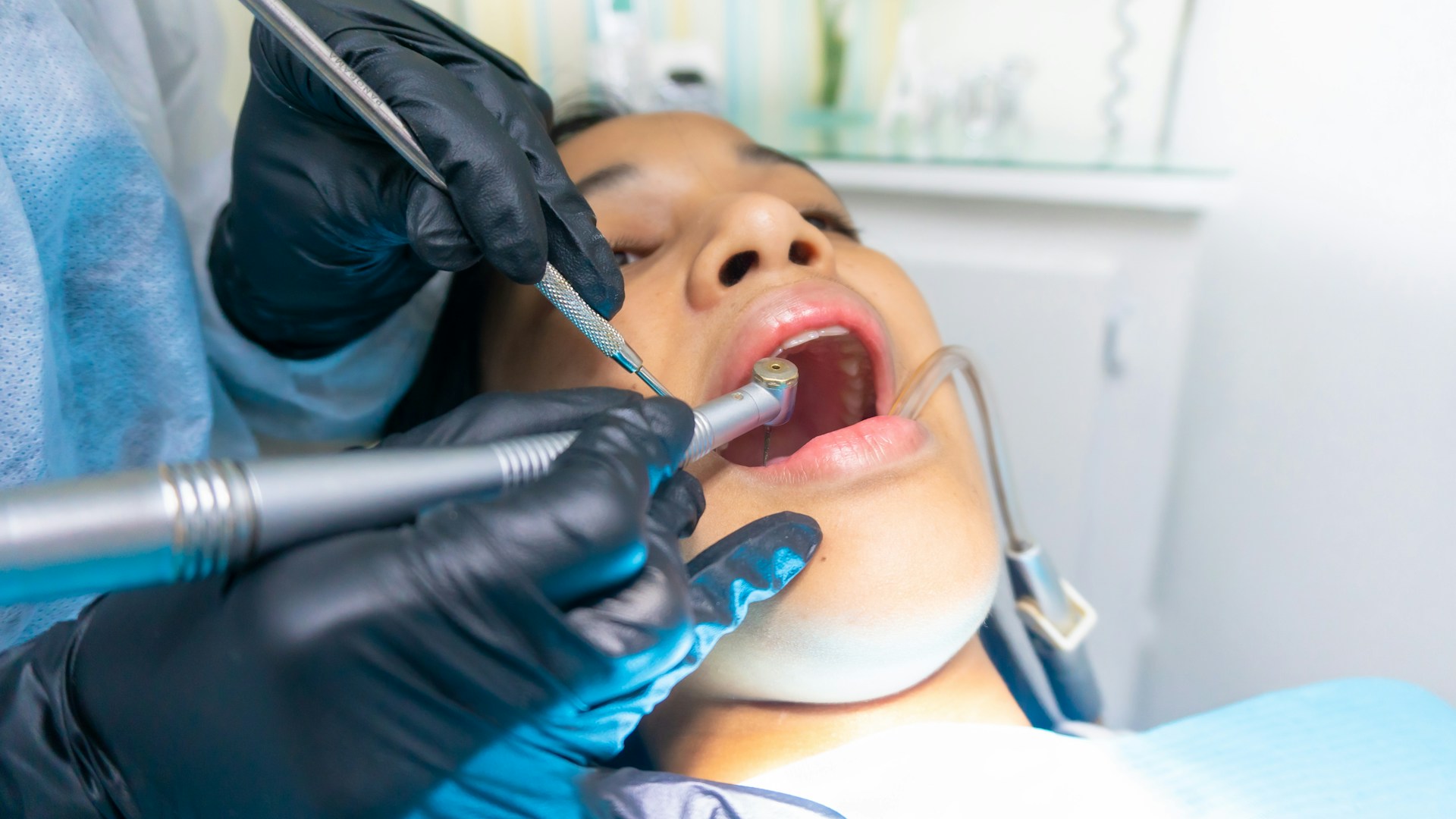 Patient receiving emergency dental treatment at an Australian clinic